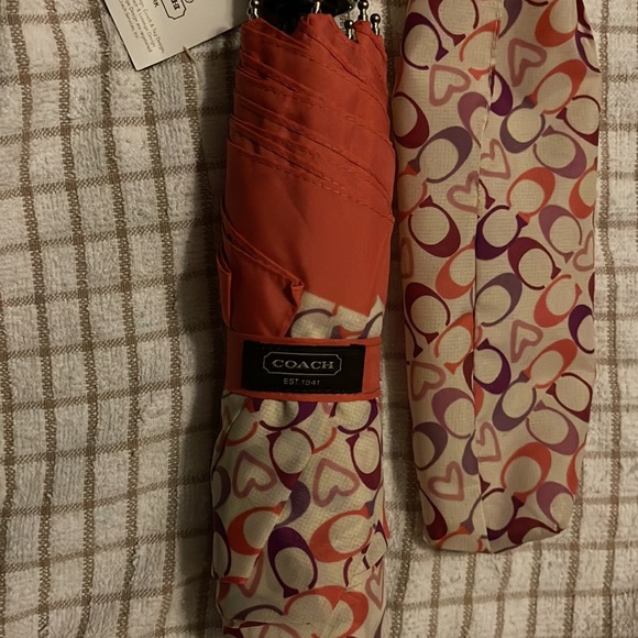 Brand new with tags Coach umbrella. Never used. - Picture 3 of 5